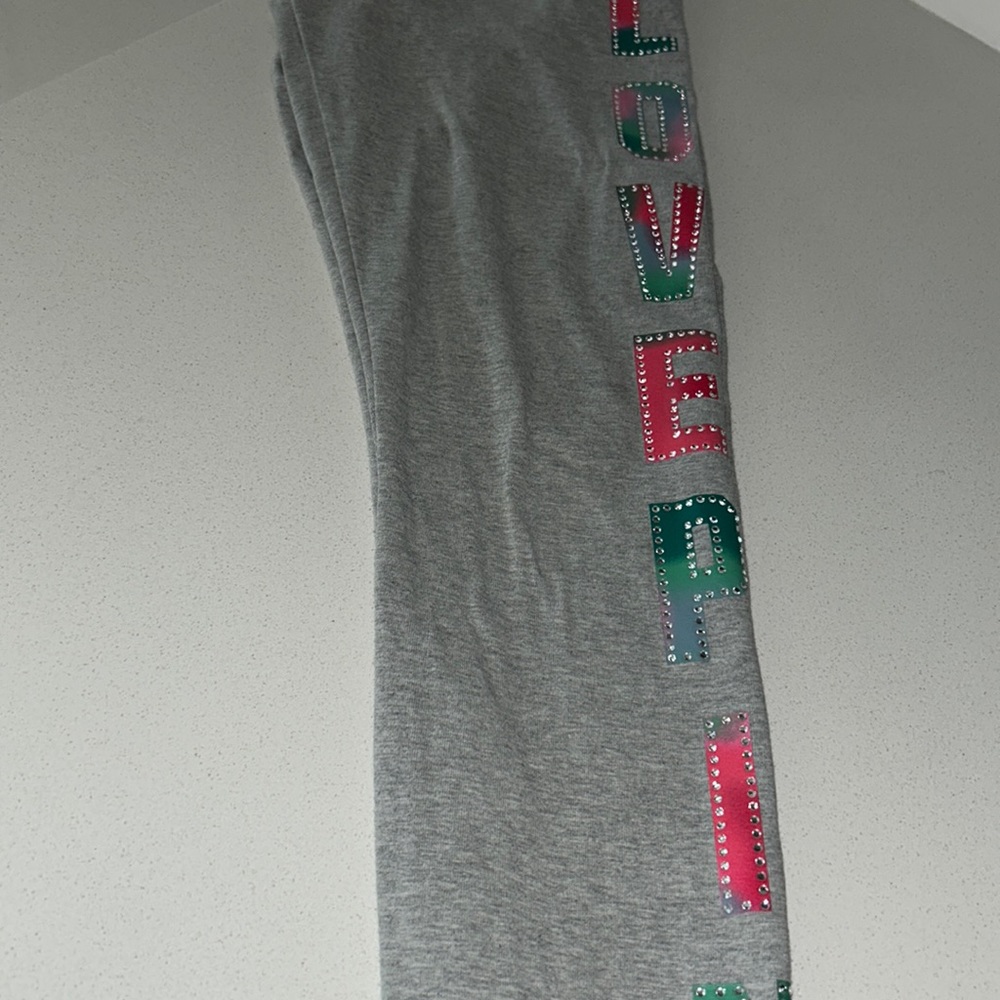 Love pink cotton leggings with diamonds on side x size small good condition x